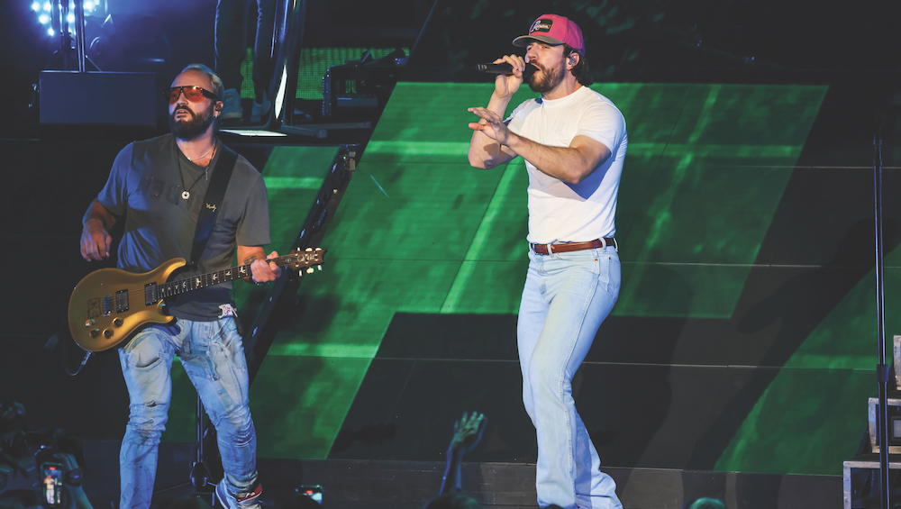 Country star Sam Hunt sports JH Audio Roxanne in-ears nightly while belting into a DPA d:facto 4018V capsule on a Shure ADX wireless. Photo by Scott Legato/Getty Images.