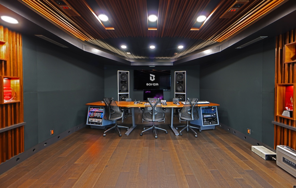 Boi-1da’s new Pilchner-Schoustal-designed studio includes an in-wall Augspurger Duo 12MF and Sub 212 monitor system, as well as a 7.1.4 Genelec Atmos system, with a Grace Design M908 monitor controller. A three-position sweet spot, designed to promote collaboration, was achieved through controlled reflection geometry that employed heavy absorption in the front ceiling and diffusion on the sidewalls. Photo: Martin Pilchner.