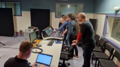 During the listening test. Left to right: David Houston (senior concert producer/audio engineer), John Neill (audio legend), Adrian Hollay (senior audio engineer), Darryl Stack (senior audio engineer), Steve Burridge (production team lead, senior audio engineer) and Mike Heard (PAT). Photo: PAT.