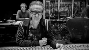 Music producer Greg Wells at the Neve console in AIR Studios, London, tracking the orchestra for the Wicked score and soundtrack album. Photo: Mike Knobloch.