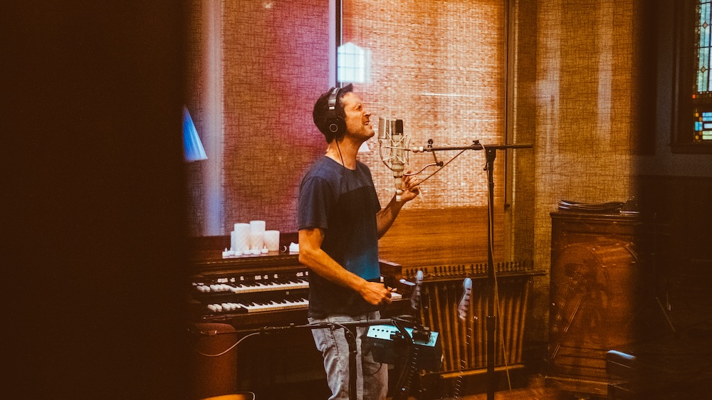 Producer, guitarist, vocalist and APQ co-founder Clay Ross in the heat of the recording sessions at Echo Mountain Studios. Photo: Sandlin Gaither.